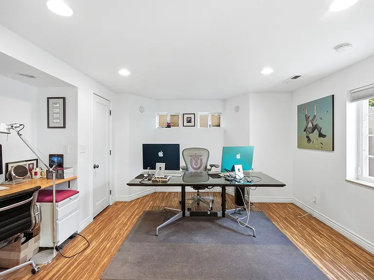 Bedroom 4 on lower level, set up here as an office.