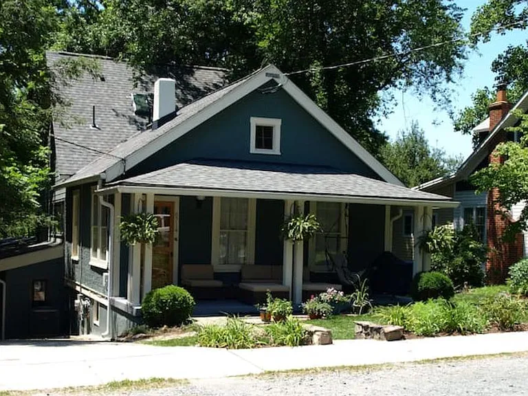 The apartment's separate entrance is at the end of the driveway.