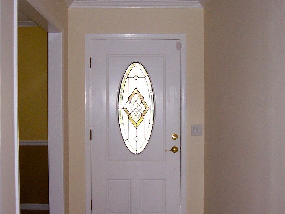 Front entrance with dining room on left