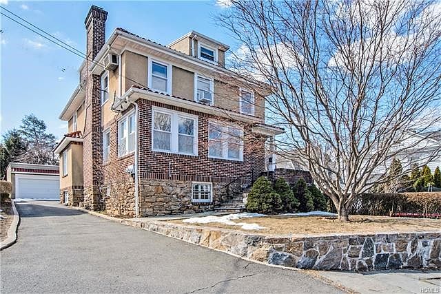 Classic brick home is a two family - 5 minute walk from Mamaroneck Metro!