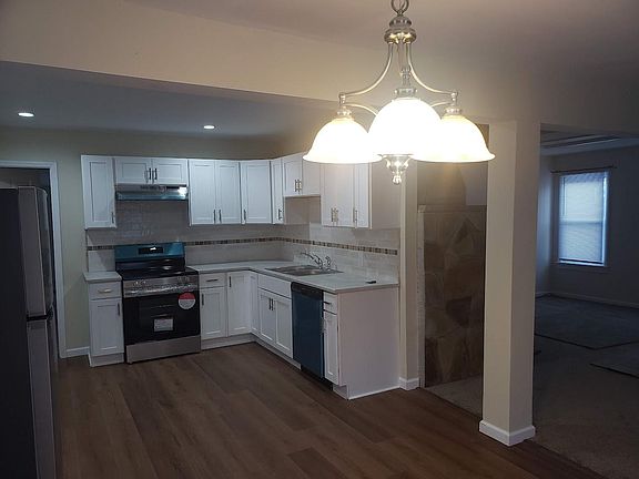 Kitchen, dining room area and living room area
