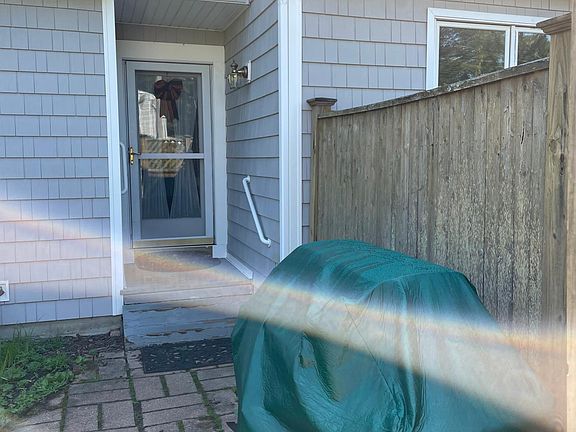 Front door entrance.
The grill and old wood fence sections are gone replaced by new vinyl fencing and a new vinyl gate.