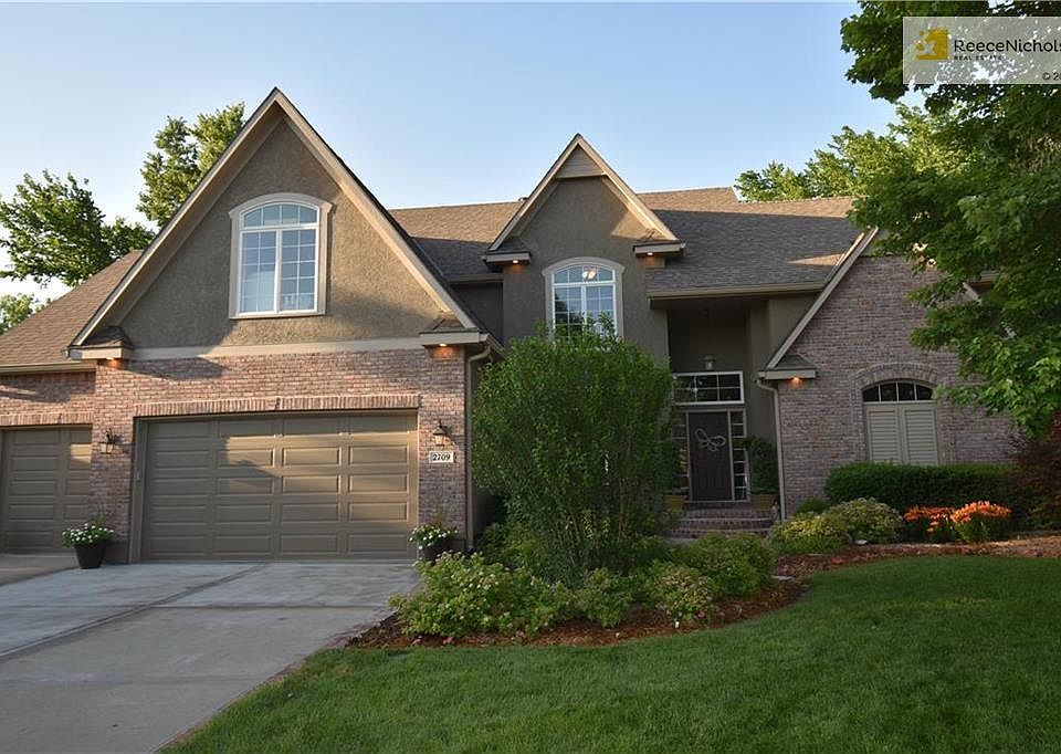 French Country Design 1.5 Story. New in last 9 months; Ext. Paint, 5" Gutters/Downspouts, All new Hardwood Floor refinish, New Black Iron Spindles (106 of them), Lots of new Interior Paint, Brand New Basement Shop 9' x 7' Overhead Garage Door, More.......