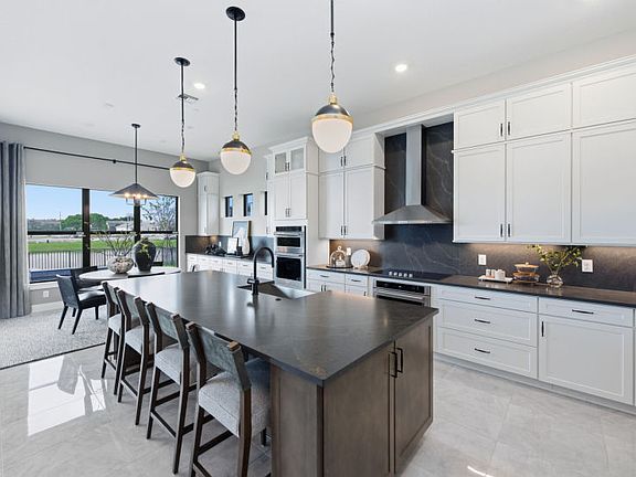 Sleek Finishes, Gourmet-Ready Space