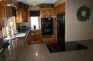 Solid surface countertops, undermount sink and new appliances