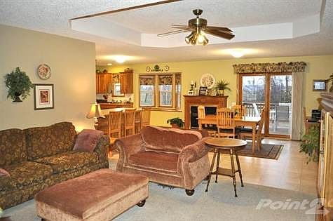 Semi open floor plan that leads from the livingroom into the kitchen area.