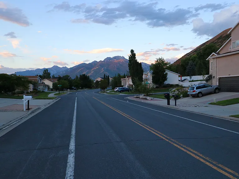 View of street outside home looking east - road comes to dead end at flight park half mile to west