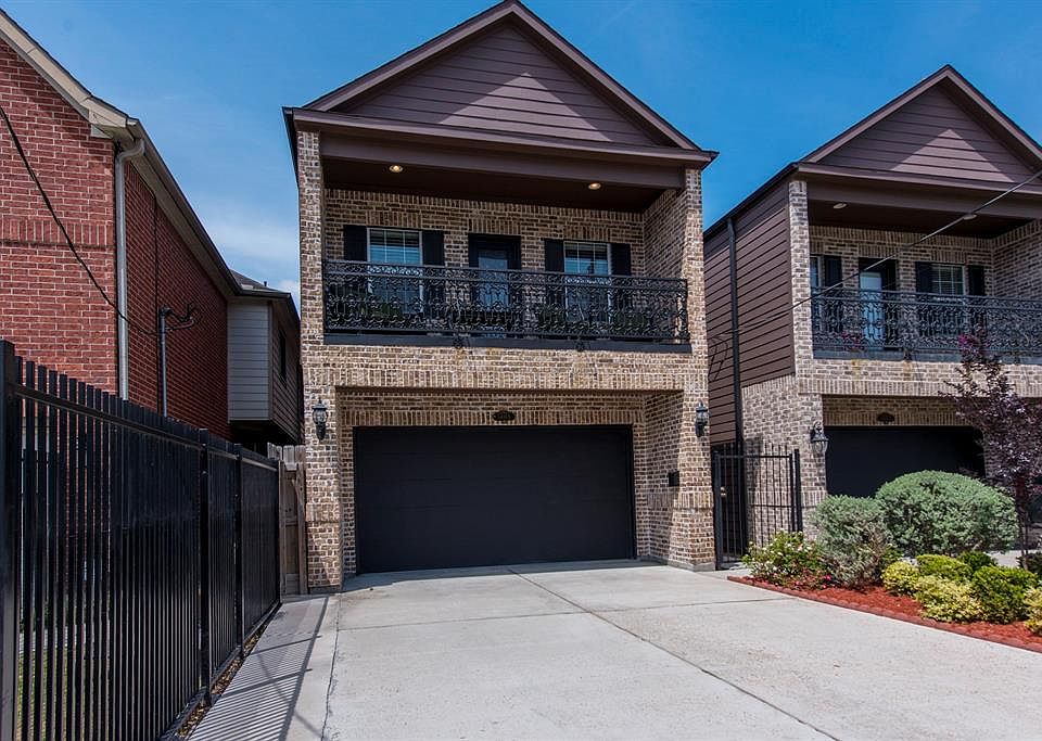 2 story with double driveway to the street.
