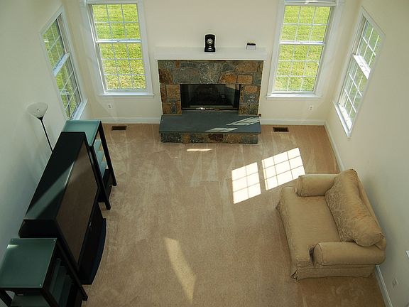 View of the family room from the second level balcony.