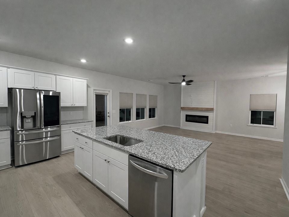 Great open kitchen, living room and dining room area perfect for hosting and family gatherings.