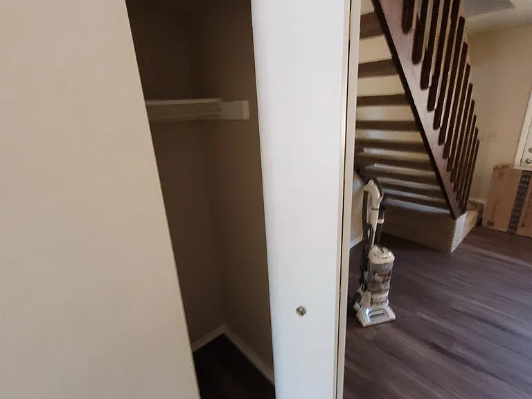 Coat closet in entry hall