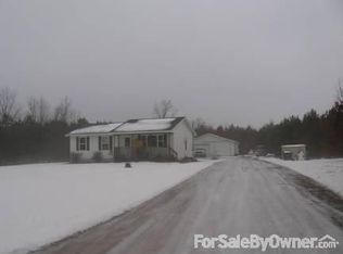 16428 Tamarack Rd, Howard City, MI 49329