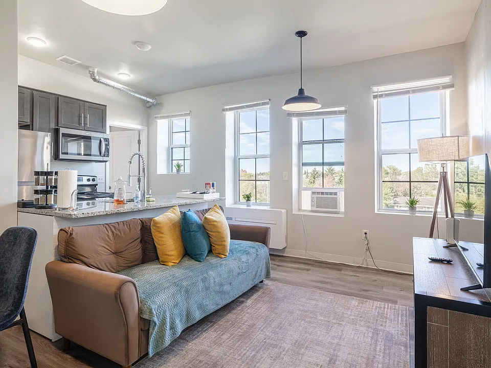 Spacious loft-style layout connecting the kitchen and living spaces seamlessly.