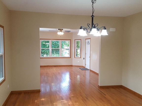 Dining room and living room, front door view