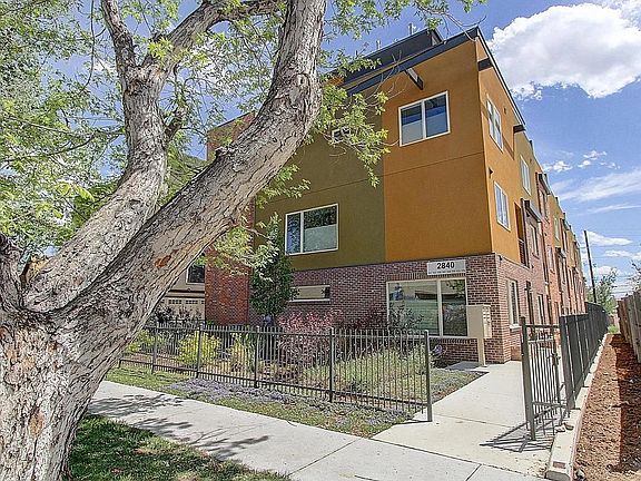 City living at it's finest! Unit is off of 26th, with a large 2-car garage