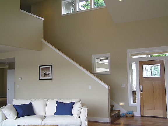 greatroom has soaring ceilings and craftsman detailing