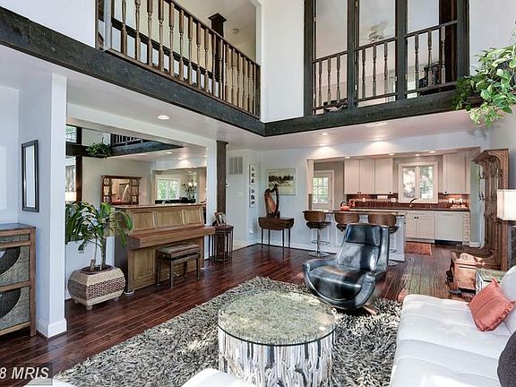 Large Family Room with Lovely Wide Plank Hardwood