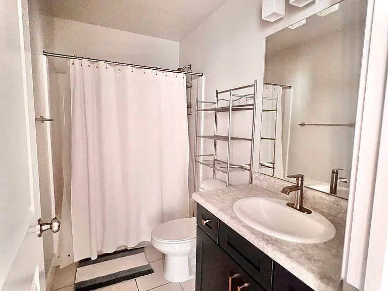 Main bathroom shared between 3 tenants