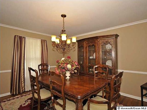DINING ROOM WITH HARDWOOD FLOORS