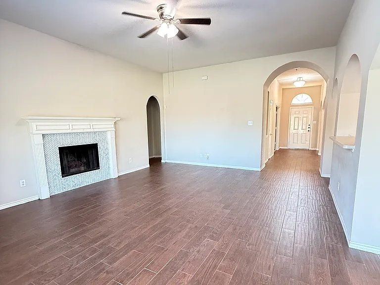 open floor plan with family room opening up to kitchen