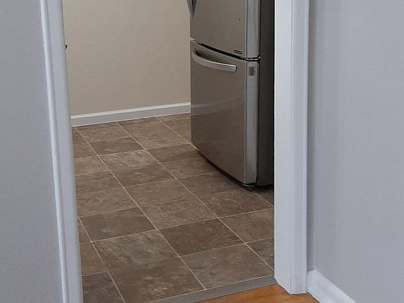 Kithcen has two entry areas one off the living area and theother off the hall way