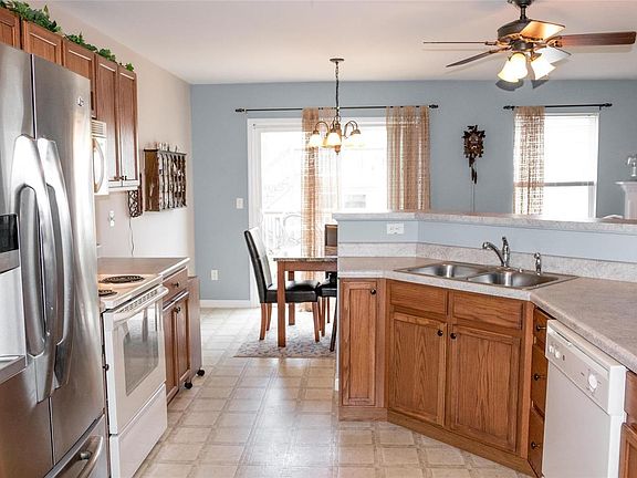 Tons of cabinets and countertop space with large pantry