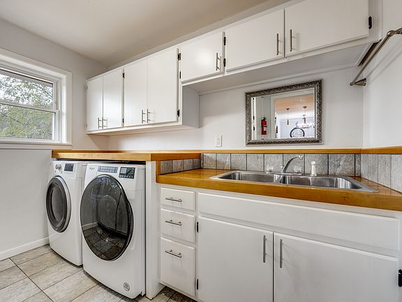 Laundry Room with washer and dryer and sink.