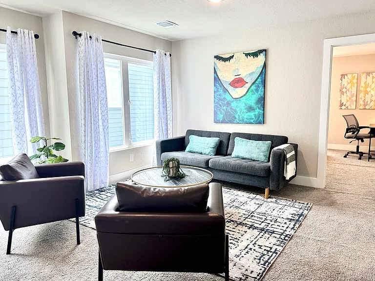 Enjoy socializing or relaxing in the upstairs loft which features lots of natural light