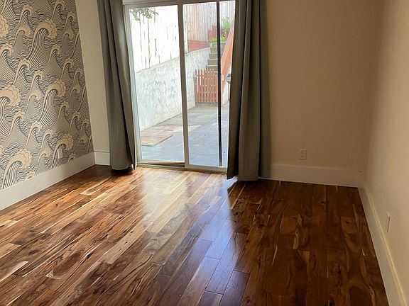 Bedroom with sliding glass door to patio