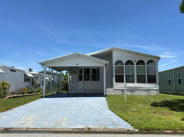 646 Periwinkle Cir, Barefoot Bay, FL 32976