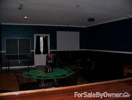 Man's Cave/ Game Room in the Garage
						:
						We will include Screen and Projector plus the sound system if wanted by buyer!