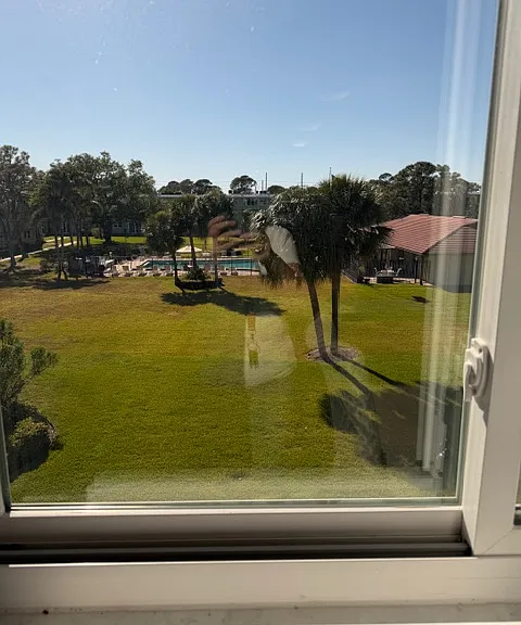 View of courtyard and pool from kitchen