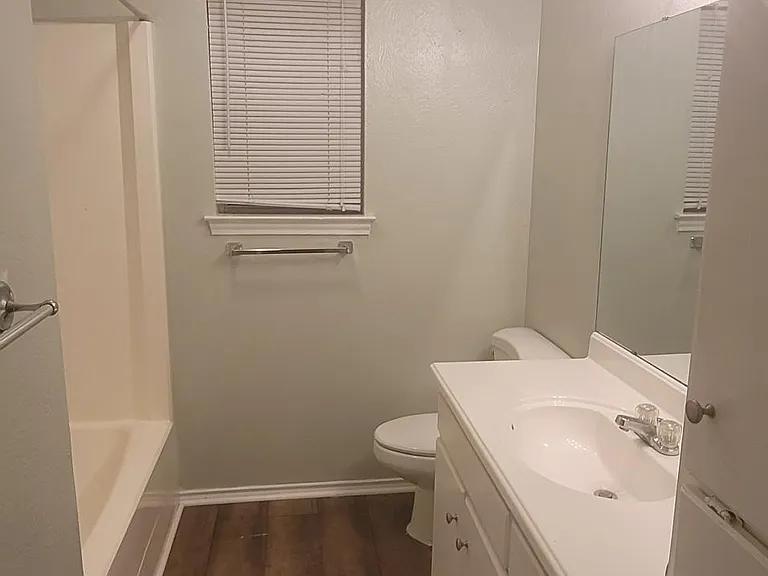 hall bath with tub and shower