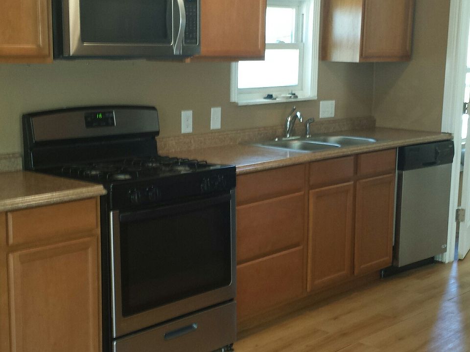 Newer Appliances, Cabinets, Countertops & Flooring