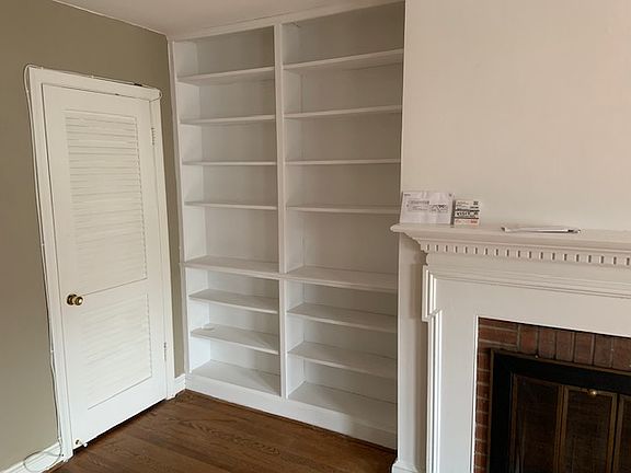 Built in bookcase. Coat closet