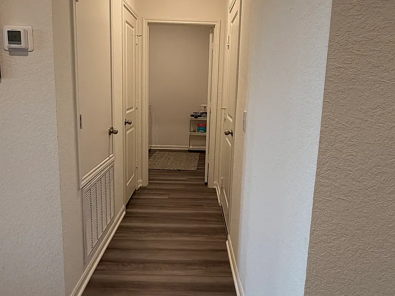 Hallway to coat closet / garage / laundry room