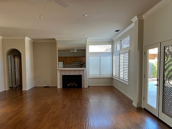 LIVING ROOM LARGE OPEN PLAN WITH GAS LOG FIREPLACE AND COVERED PATIO ACCESS