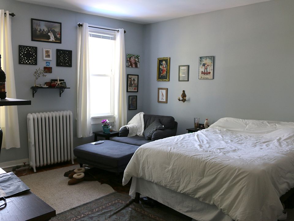 This is the available bedroom. It has two large windows and two closets and plenty of space for furniture.