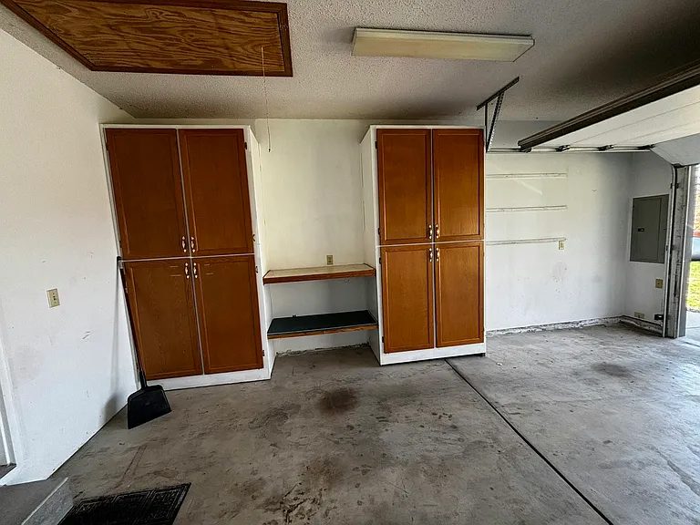 2 car garage with builtins