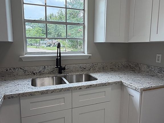 New Kitchen Renovation:
Granite Countertops and Stainless Steel Appliances