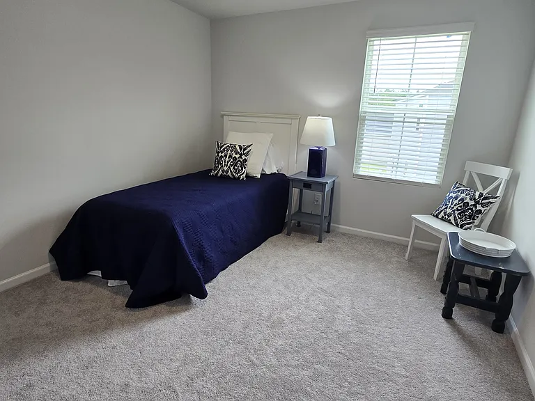 Twin bedroom has 2 twin beds