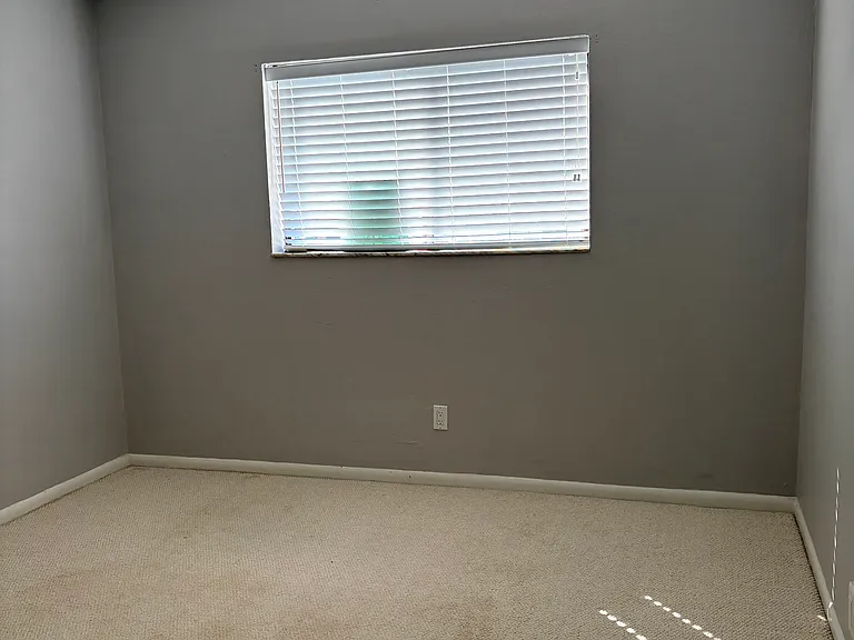 2nd bedroom, adjacent to hall bathroom