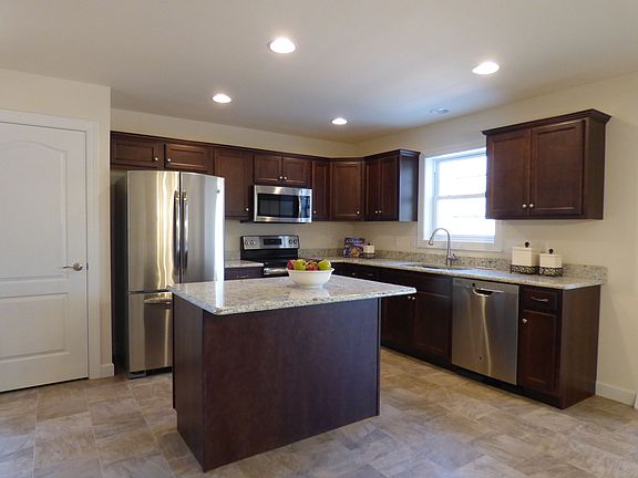 Kitchen. Photo from similar home.