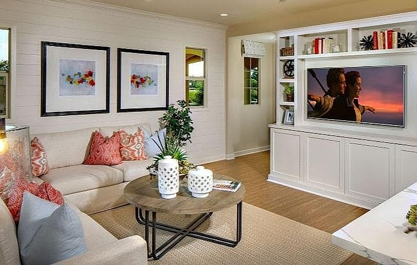 This is the model home living room with the optional entertainment built-in cabinets.
