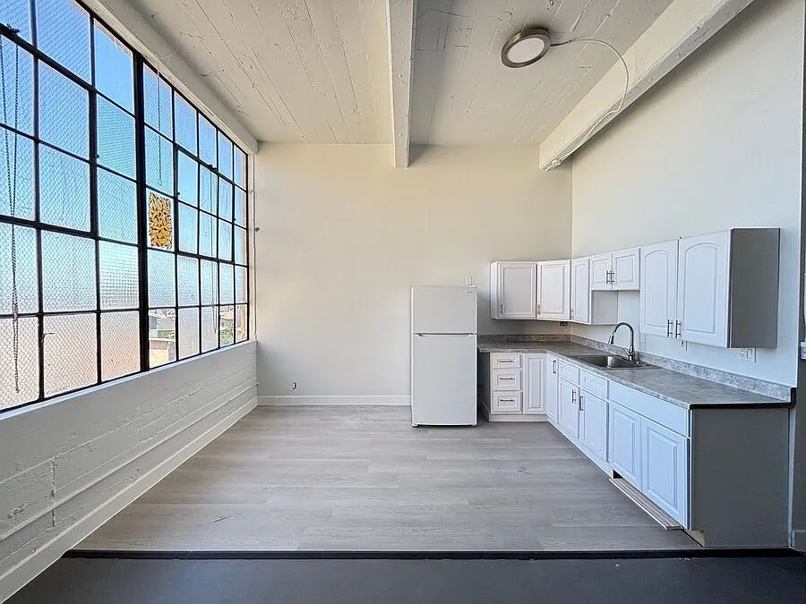Building Photo - 1341 58th Ave #12