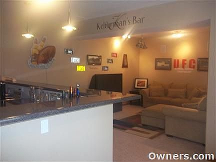 huge professional finished basement family room and bar