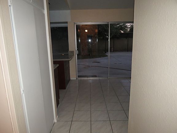 Entry to kitchen, pantry on the left