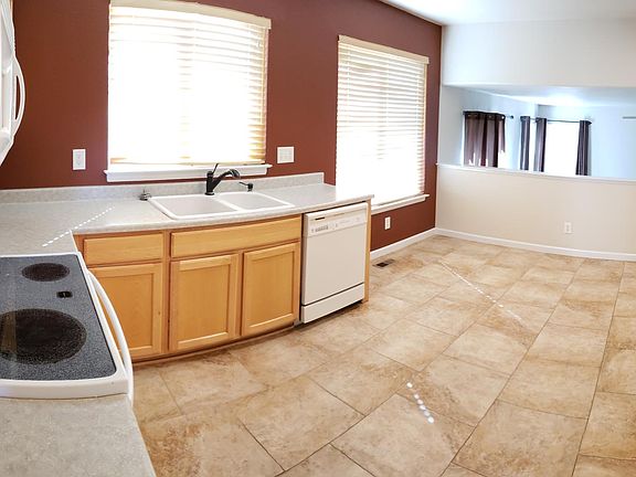 Kitchen Panoramic View facing Family Room on lower level, look at those beautiful tile floors!!