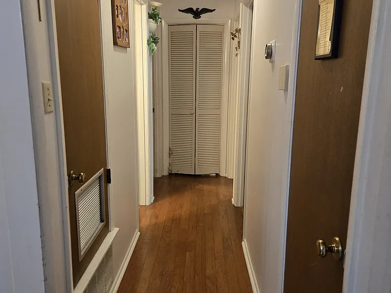 Hallway connects the shared spaces with the bedrooms and bathrooms! Not pictured: Front living room, office/children's bedroom, den, and the fenced-in backyard.