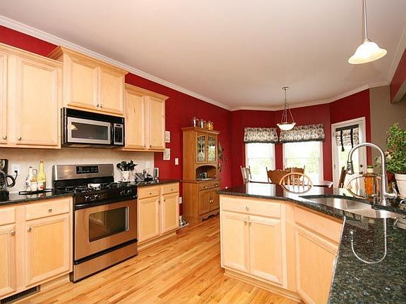 Warm and inviting kitchen with new granite!